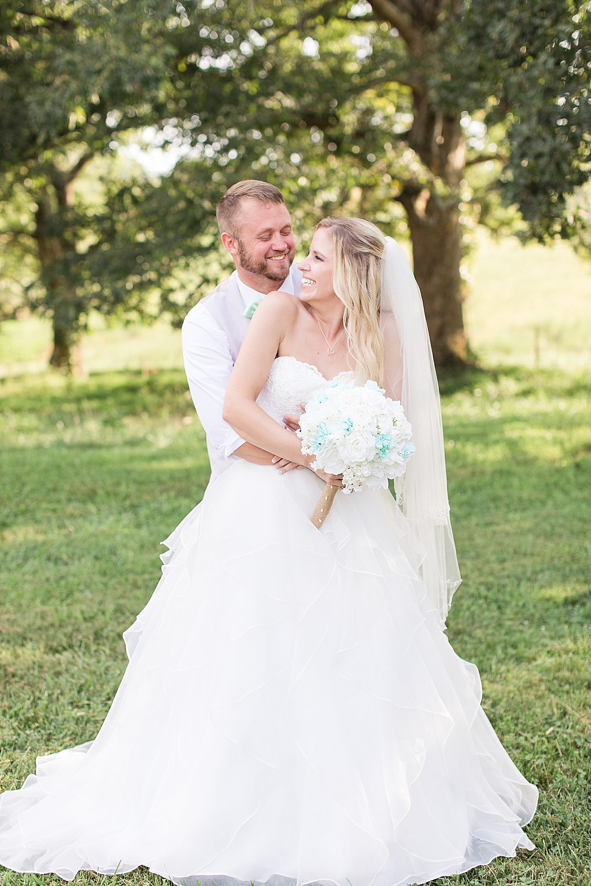 Bride and Groom at The Farmhouse at 30542 summer wedding