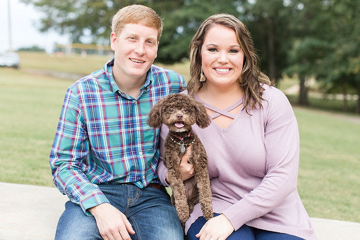 Couple with puppy spring session at Heritage Park