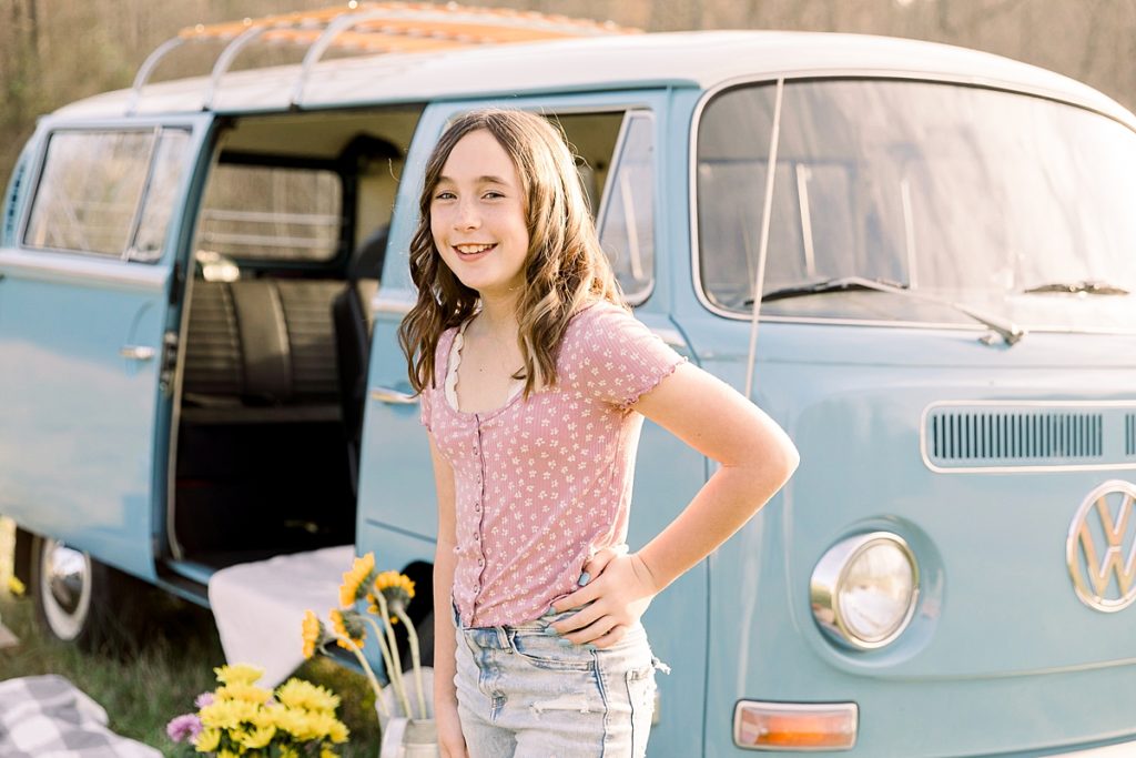 Girl poses with VW bus for spring portraits in Jackson GA