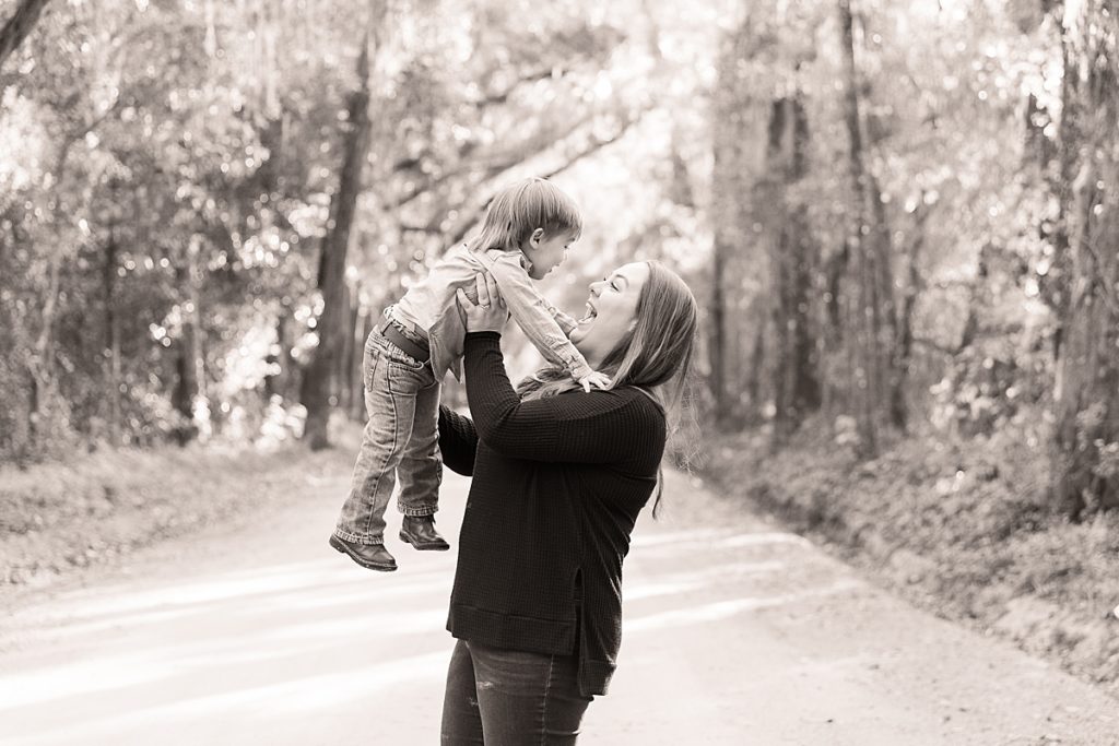 Mom poses with son for fall family portraits